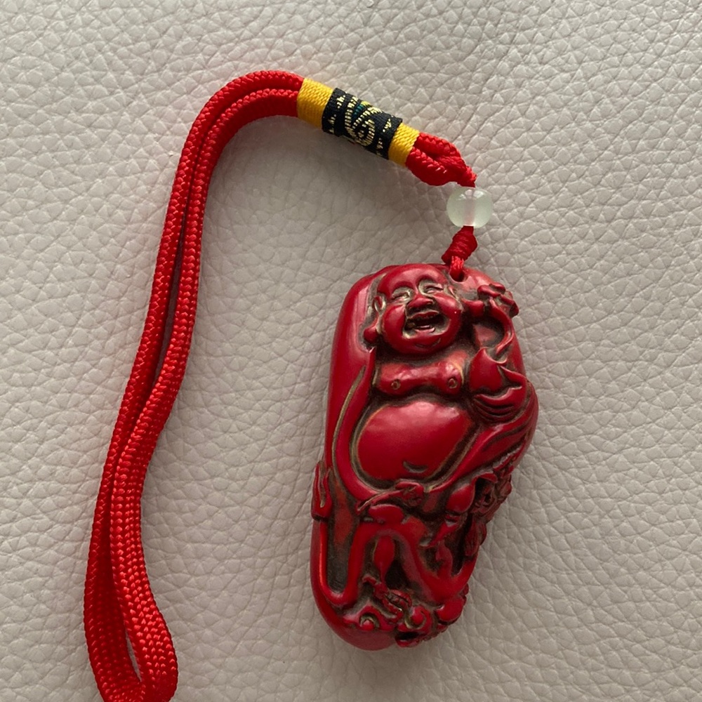 Red coral Happy Buddha- 3 inch on on red loop to hang